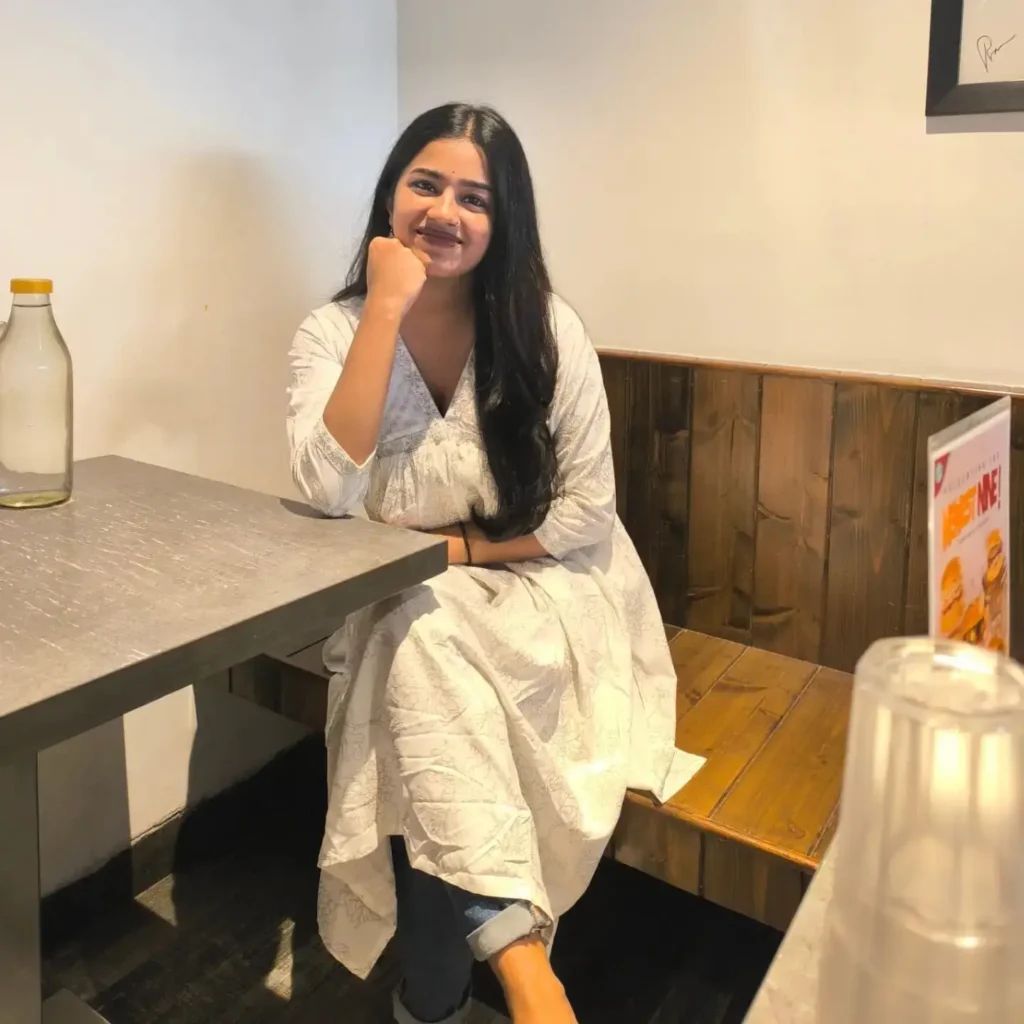 Digital marketing strategist in calicut smiling and sitting in a relaxed atmosphere